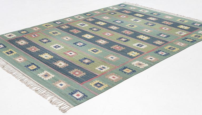 a carpet, 'Grön äng', flat weave, ca 335 x 225 cm, signed AB MMF.