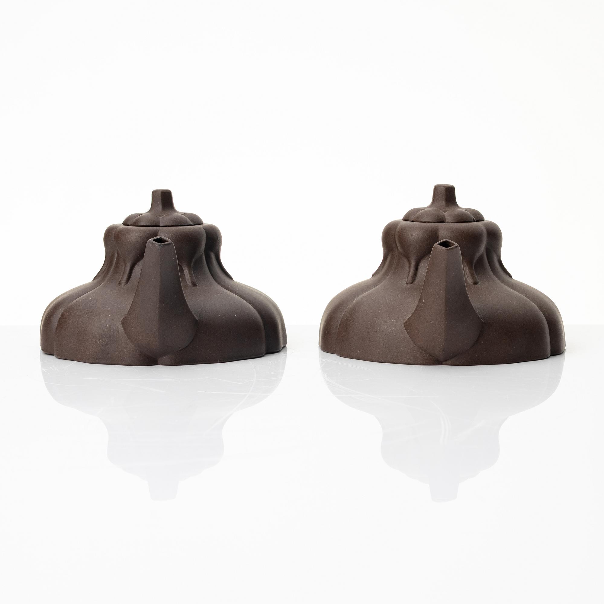 Two similar 'magnolia flower six-petal' yixing teapots, China, 1980s.