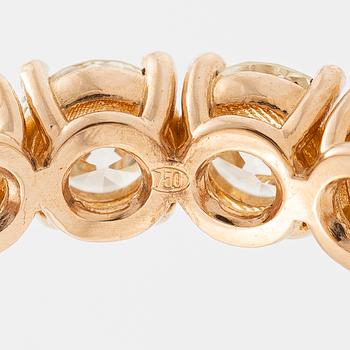 Full eternity ring in 18K rose gold set with brilliant-cut diamonds.