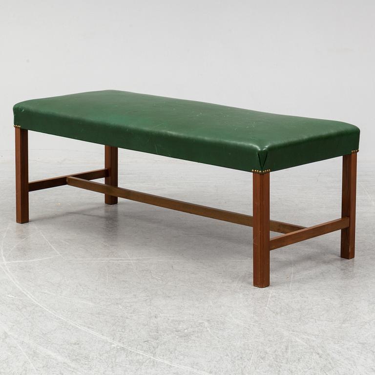 A bench "2082" by Josef Frank for Firma Svenskt Tenn.