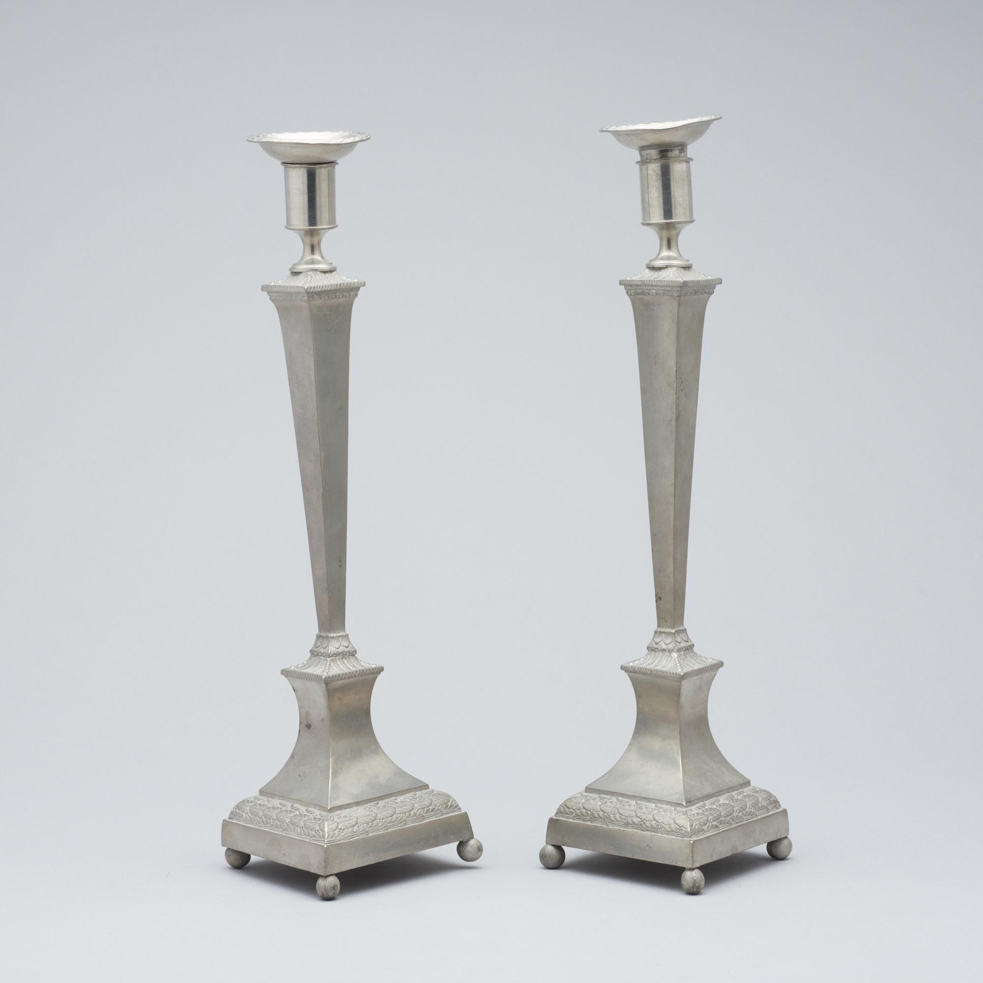 A pair of late Gustavian pewter candlesticks by M. Artedius, Norrköping 1802.