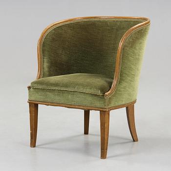 Axel Einar Hjorth, A 'Bellman' elm armchair, attributed to Axel Einar Hjorth, Nordiska Kompaniet, Sweden ca 1929.