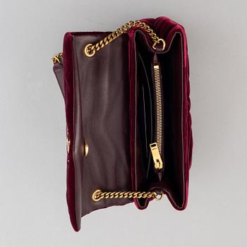 Yves Saint Laurent, a 'LouLou' velvet bag.