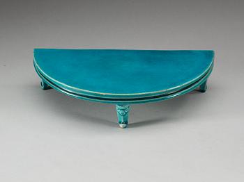 A turquoise glazed half moon shaped stand, Qing dynasty, Kangxi (1662-1722).