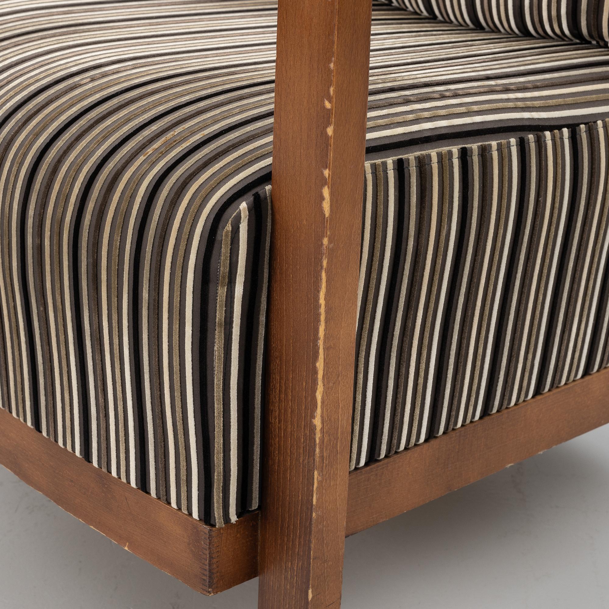 A pair of armchairs, Andreu World, Spain, 21st Century.