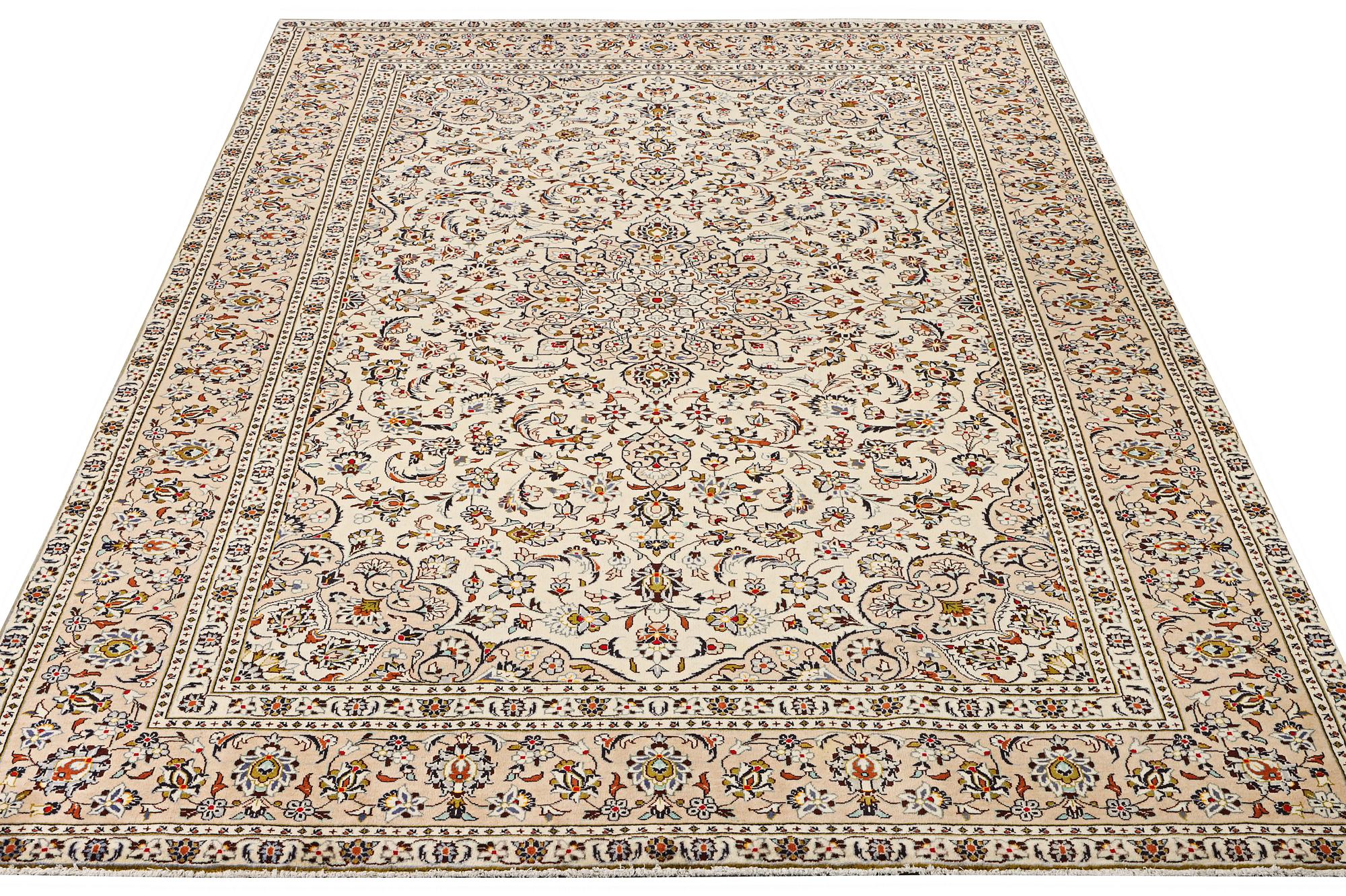 A Keshan carpet, c. 355 x 238 cm.