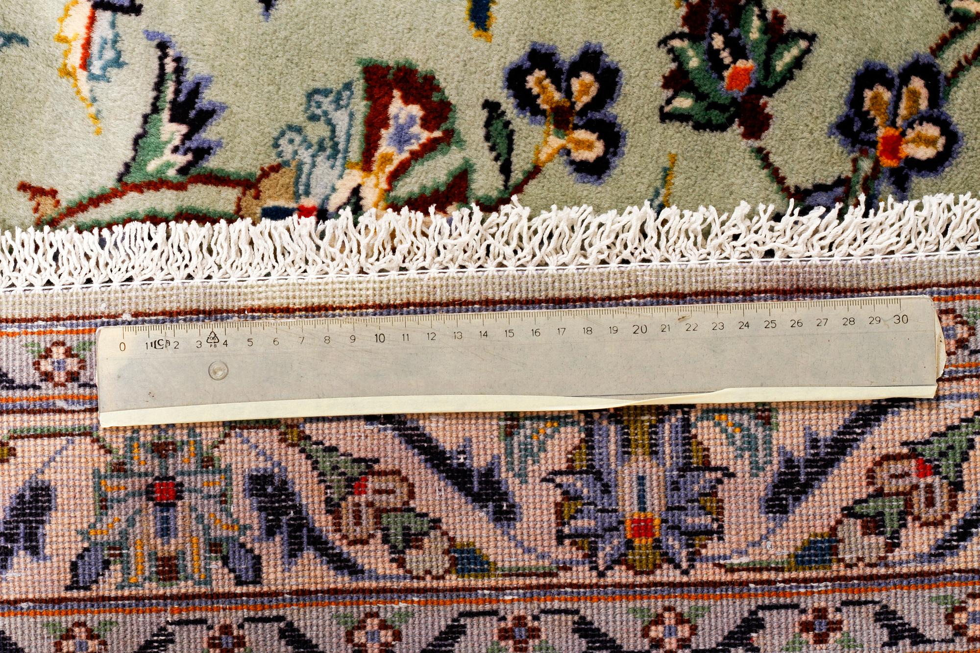 A Keshan rug, 412 x 305 cm.