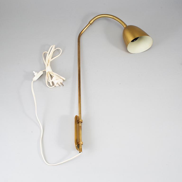 2 brass wall lights, JBE konst, Ystad, Sweden second half of the 20th century.