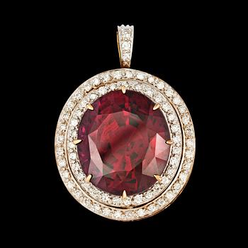 136. A garnet and brilliant cut diamond pendant, total carat weight circa 0.80 cts.