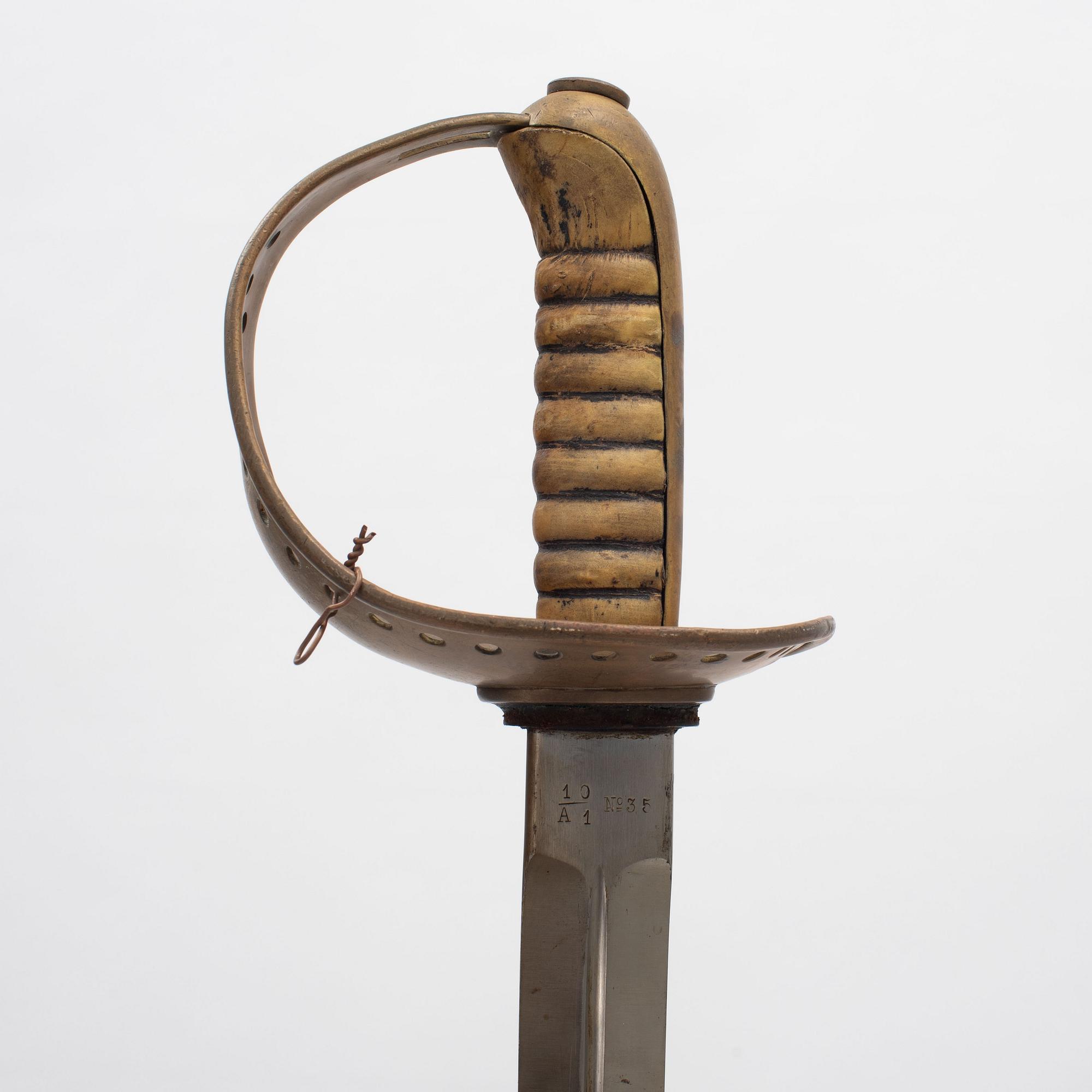 A Swedish cavalry saber with scabbard, 1893 pattern.