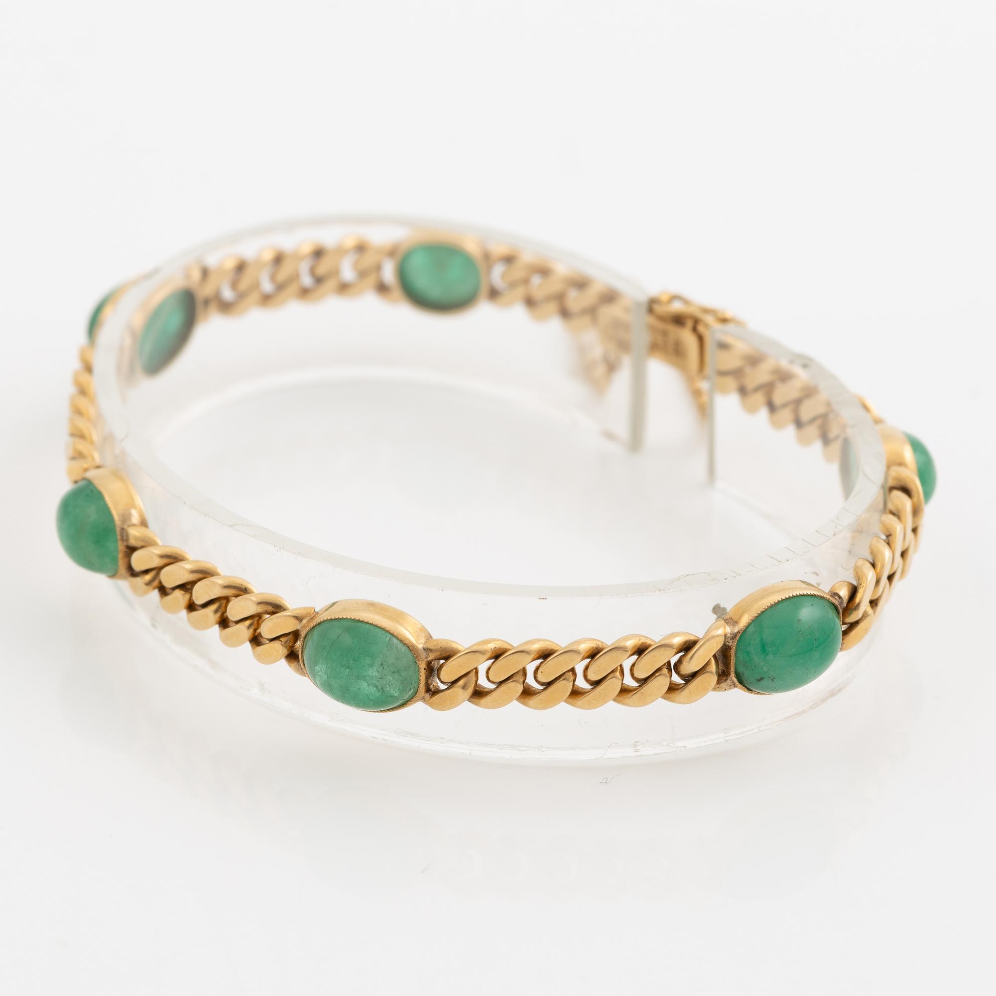 Bracelet in 18K gold with cabochon-cut emeralds, 1920s.
