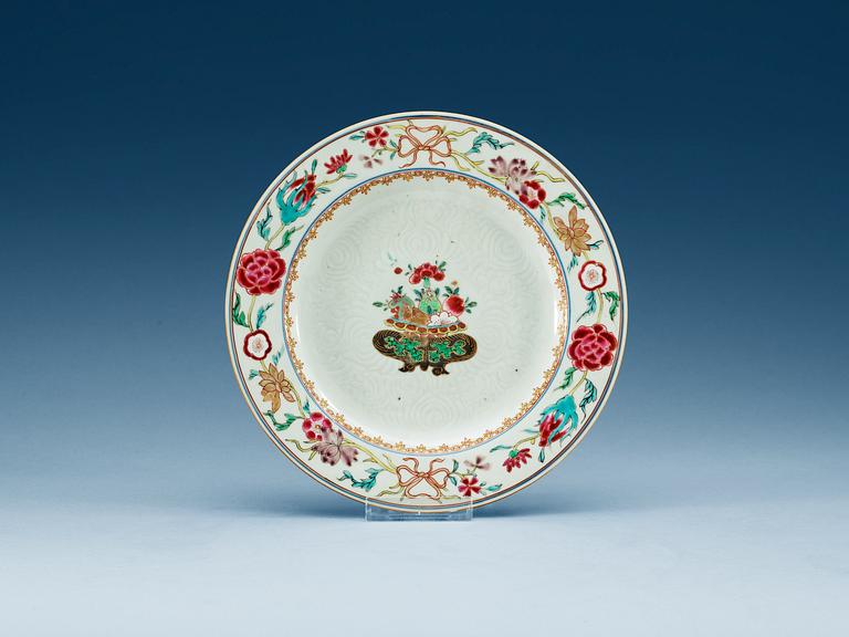 A set of 15 famille rose plates, Qing dynasty, Yongzheng (1723-35).