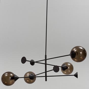 A 21st century "Kendama" LED pendant lamp, design Massimo Zazzeron, Giorgetti.