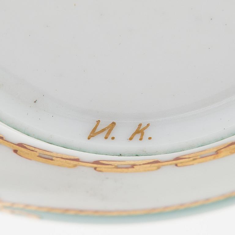 A cup and saucer from the Derzhava service, Imperial Porcelain Manufactory, St. Petersburg, late 19th century.