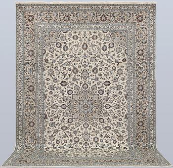 A Keshan carpet, approx. 355 x 250 cm.