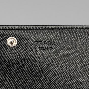 PLÅNBOK, Prada.