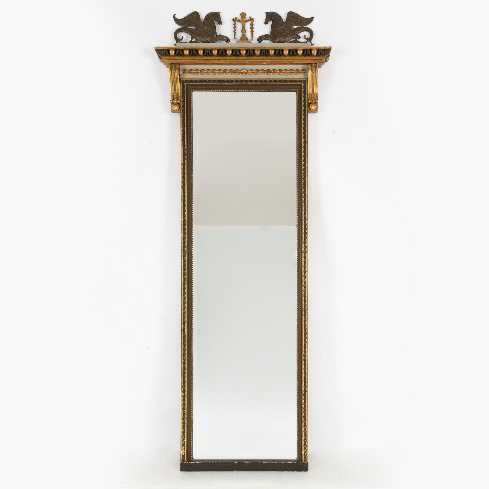A Empire style mirror, late 19th Century.