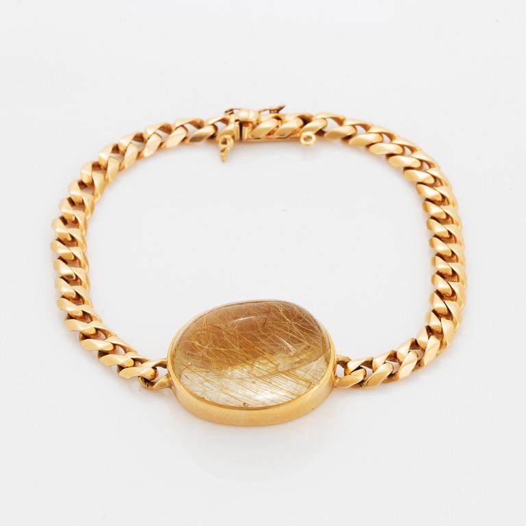 Cabochon-cut rutile quartz bracelet, 18K gold.