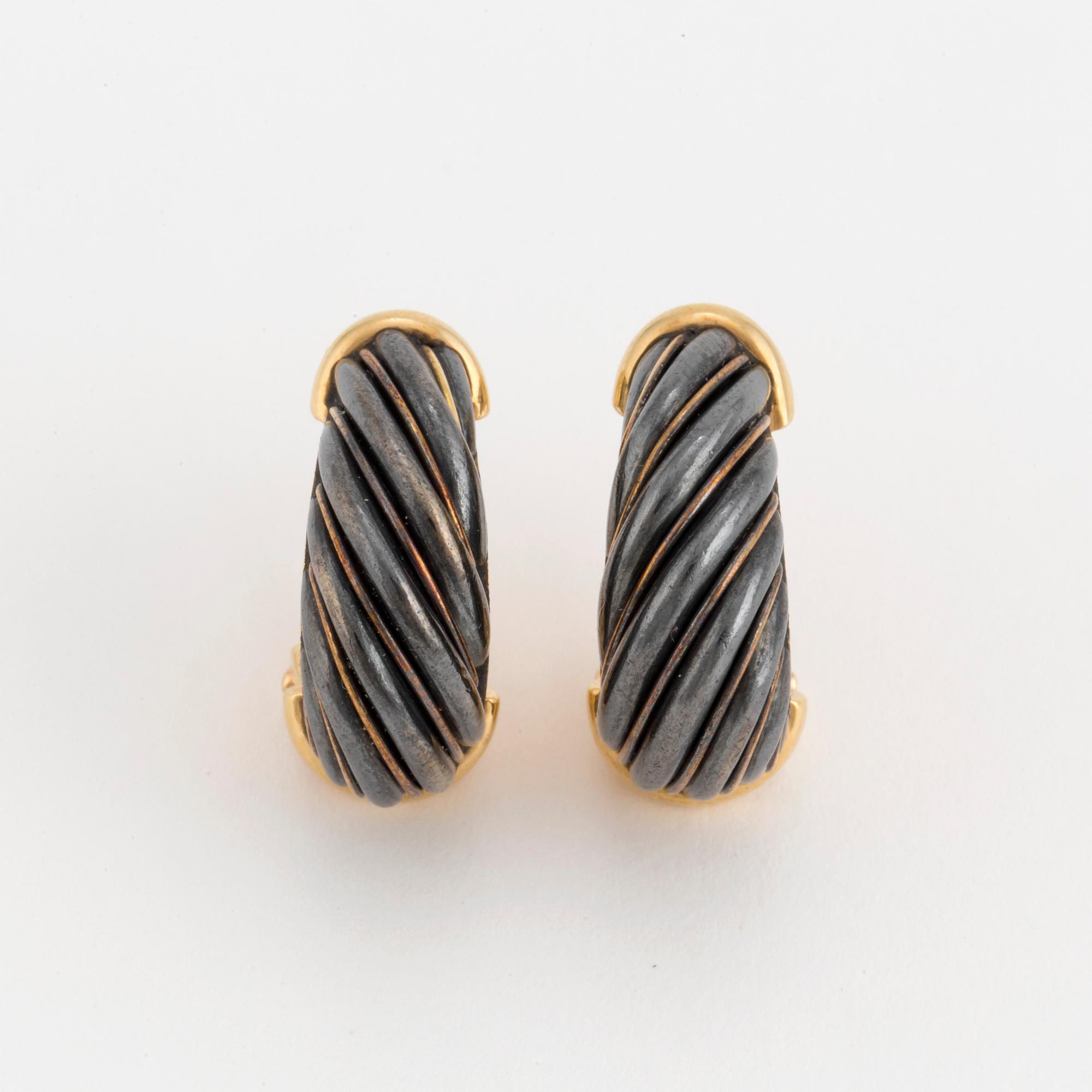 A pair of Cartier hoop earrings.