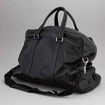 DOLCE & GABBANA, a black leather weekend bag, 2009.