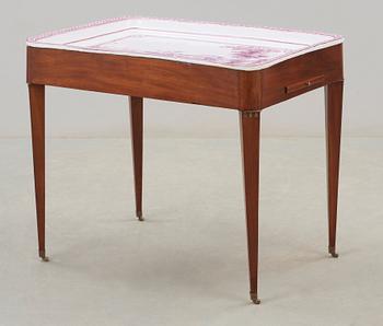 A Gustavian late 18th century faience tea table.