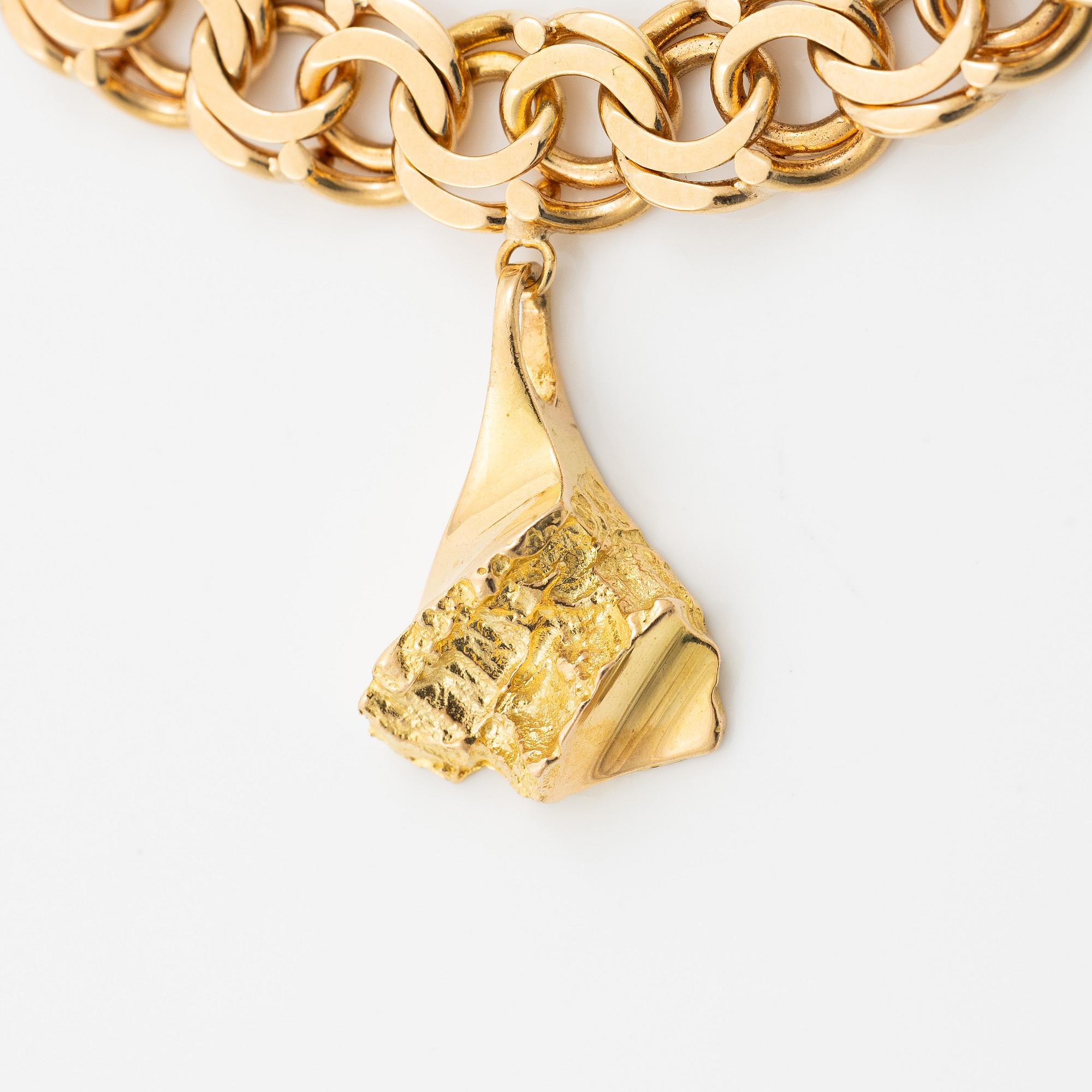 Bracelet, 18K gold, with charms including zodiac signs.