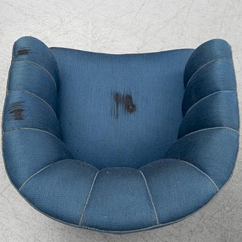 A pair of 1950's armchairs.
