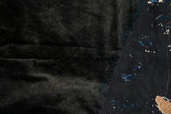 An embrodiered textile with a five clawed dragon, lined with yellow silk, Qing dynasty.