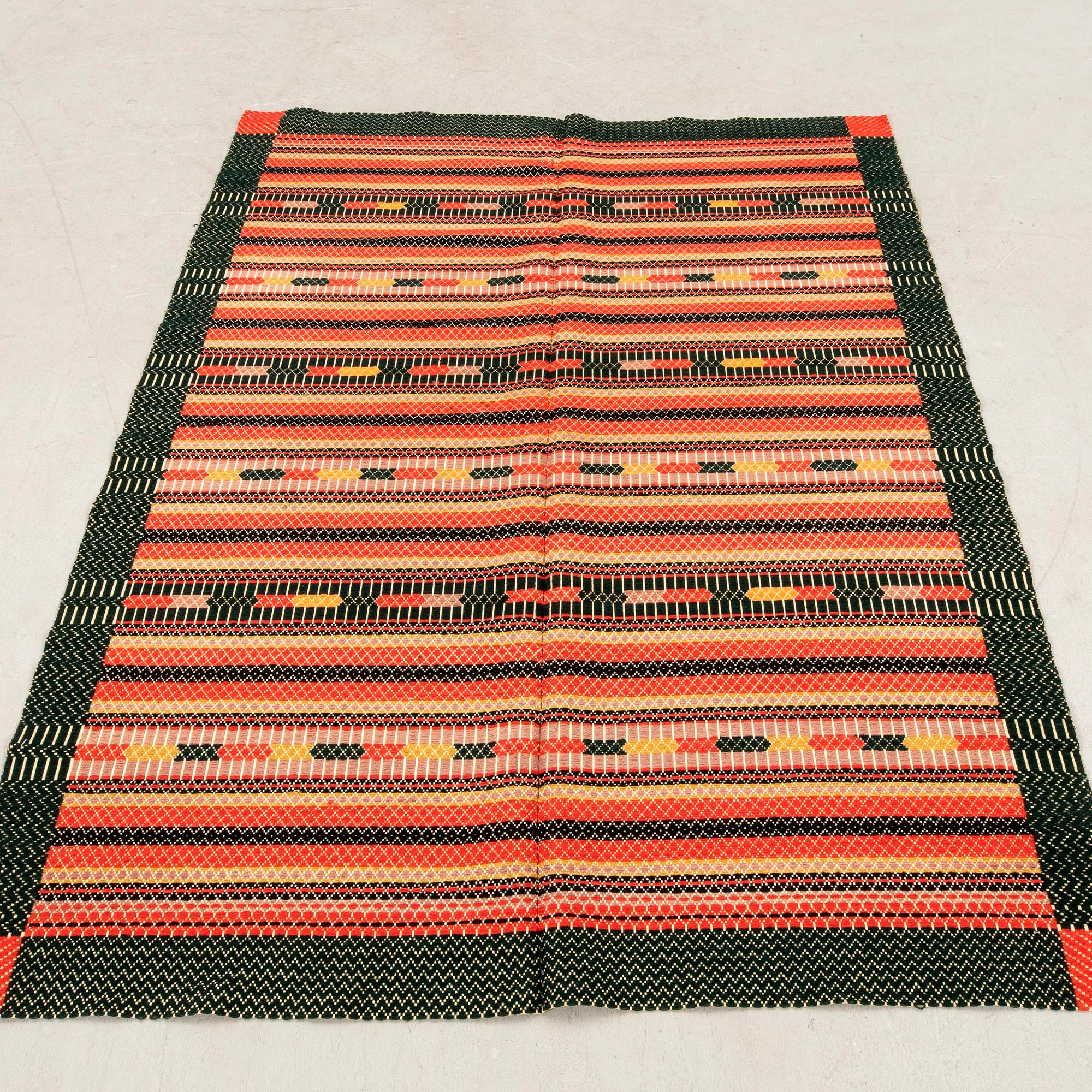 Quilt, Scania circa 1900, composed of two stitched panels, 169x137 cm, signed.