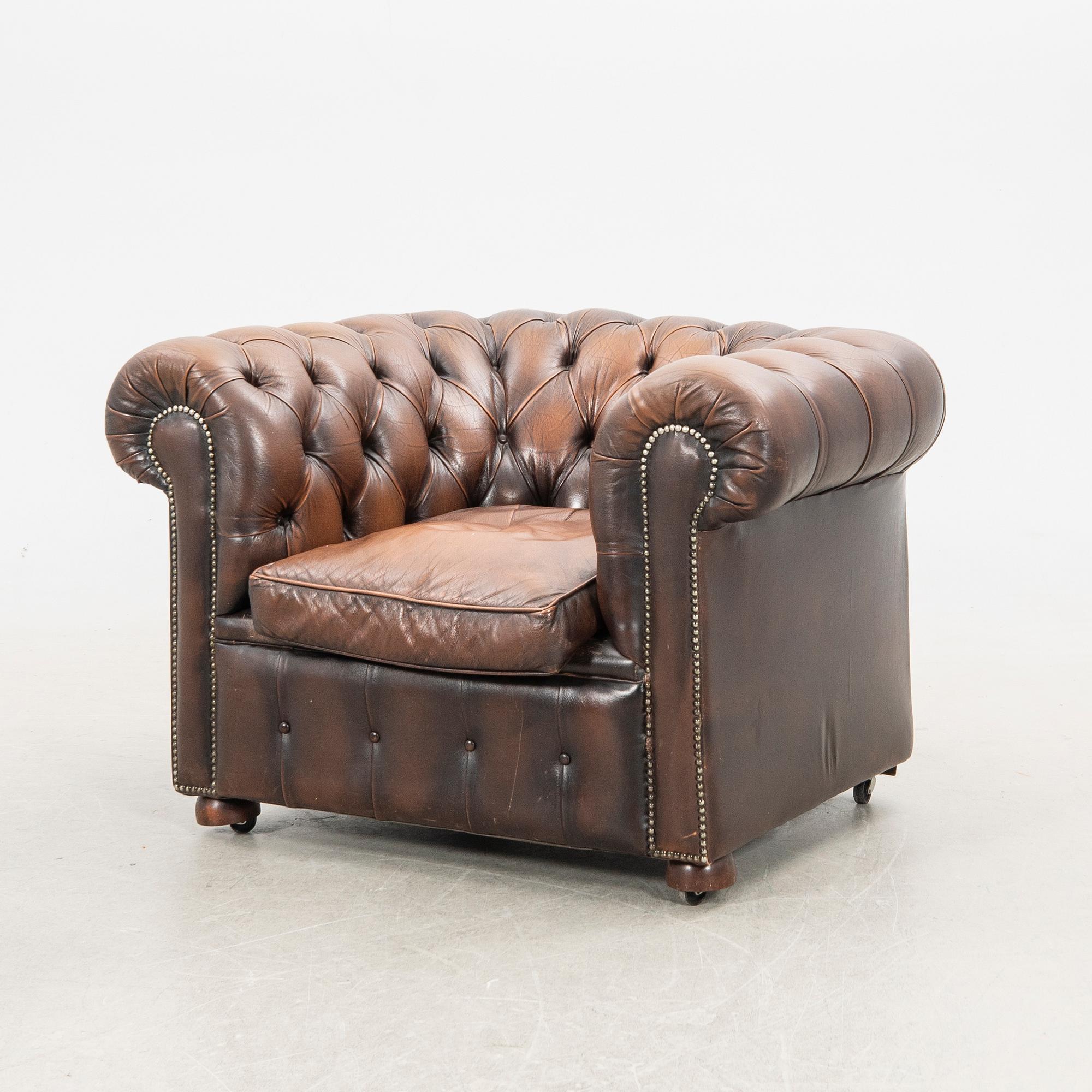 Sofa and armchair, Chesterfield, 20th century.