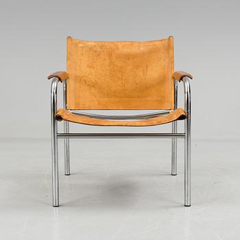 a leather and metal armchair, probably by IKEA.