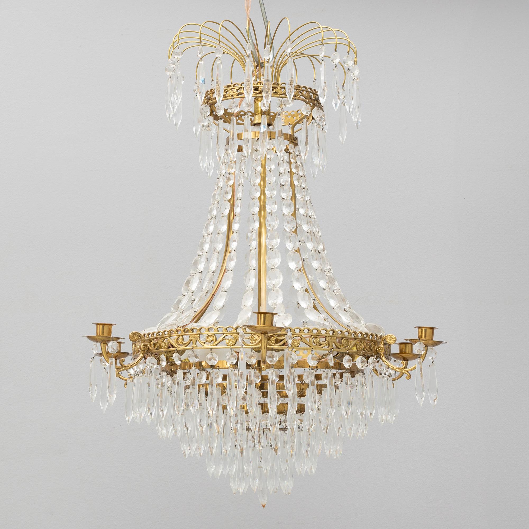 An Empire style chandelier, first half of the 20th Century.