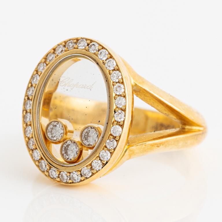 Chopard ring 18K gold with round brilliant cut diamonds.