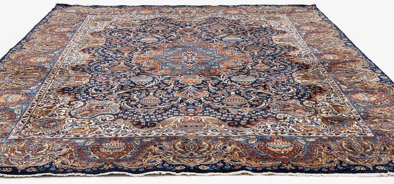 A Kashmar rug, c. 396 x 300 cm.