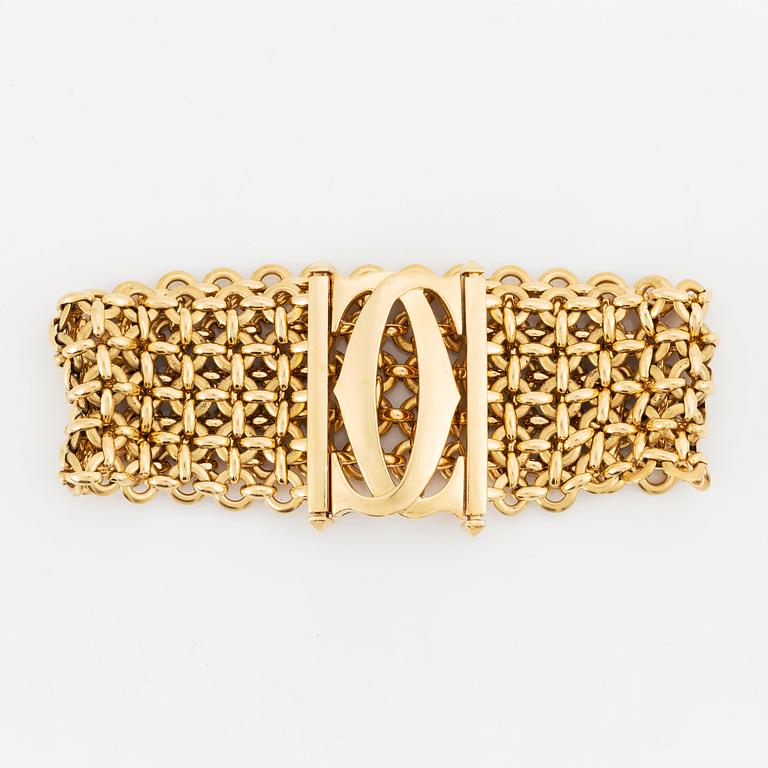 A Cartier 18K gold bracelet.