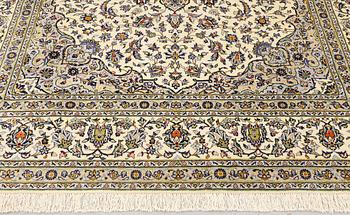 A Keshan carpet, approx. 355 x 260 cm.