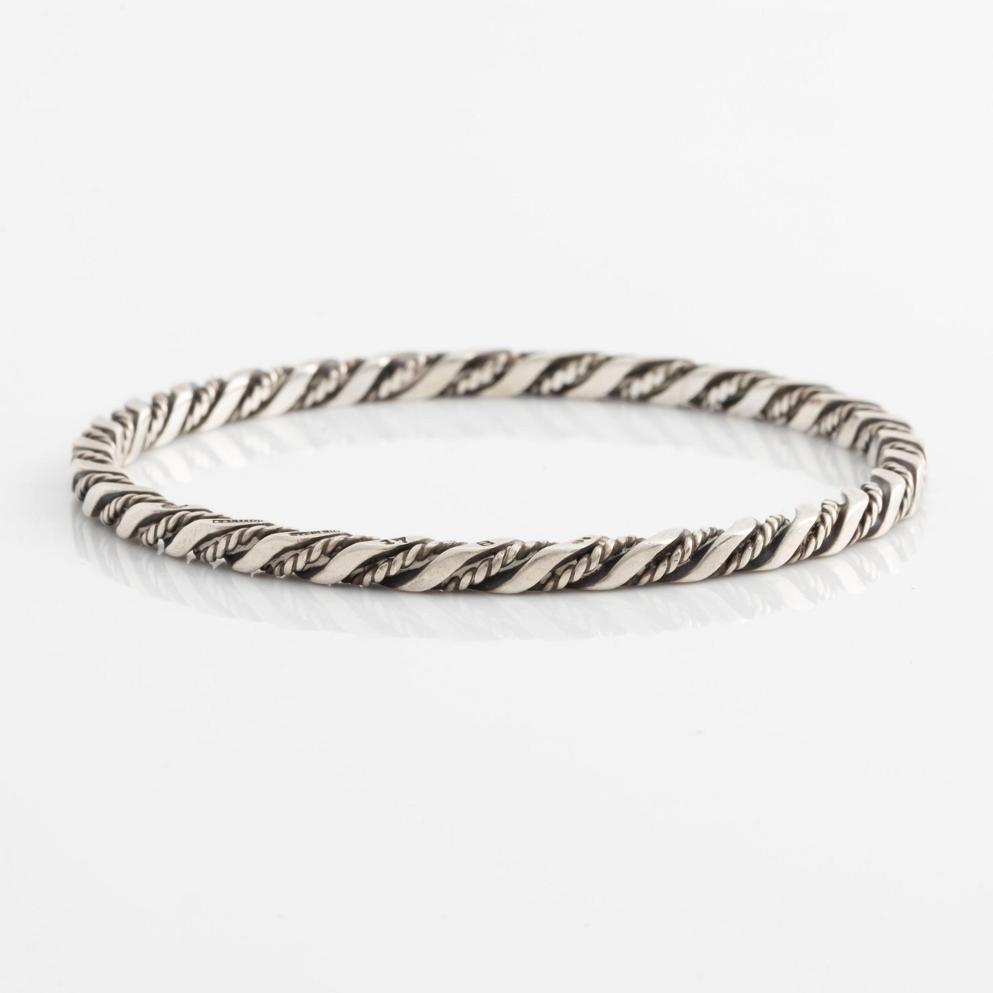A Georg Jensen bangle in sterling silver.