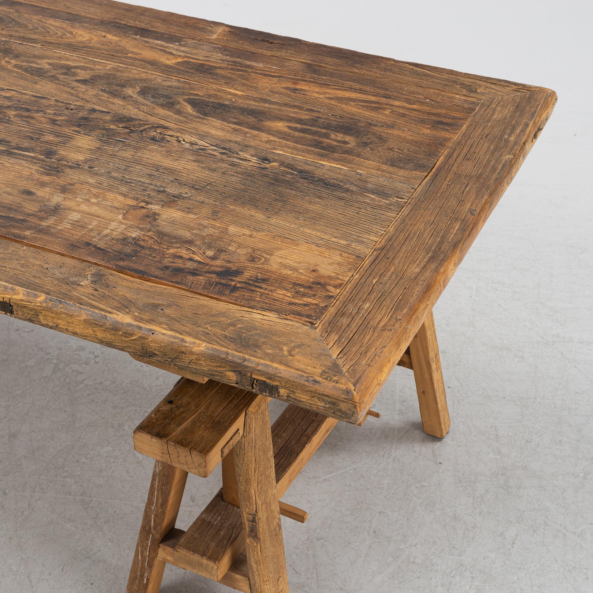 A Walles & Walles dining table.