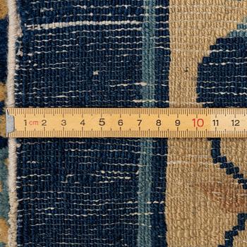 An antique Peking (Beijing) carpet, North China, c. 340 x 275 cm.