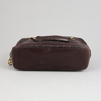 Chanel, a burgundy leather handbag, 1989-91.