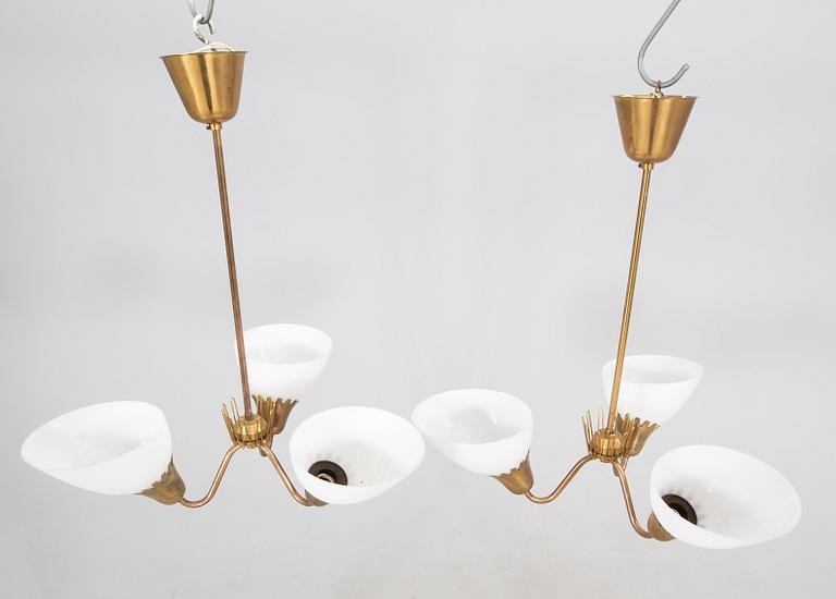 A pair of  ASEA Belysning brass 1950s ceiling pendants.