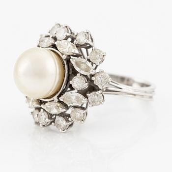 Ring, cocktail ring, 18K white gold with marquise and brilliant cut diamonds and a pearl.