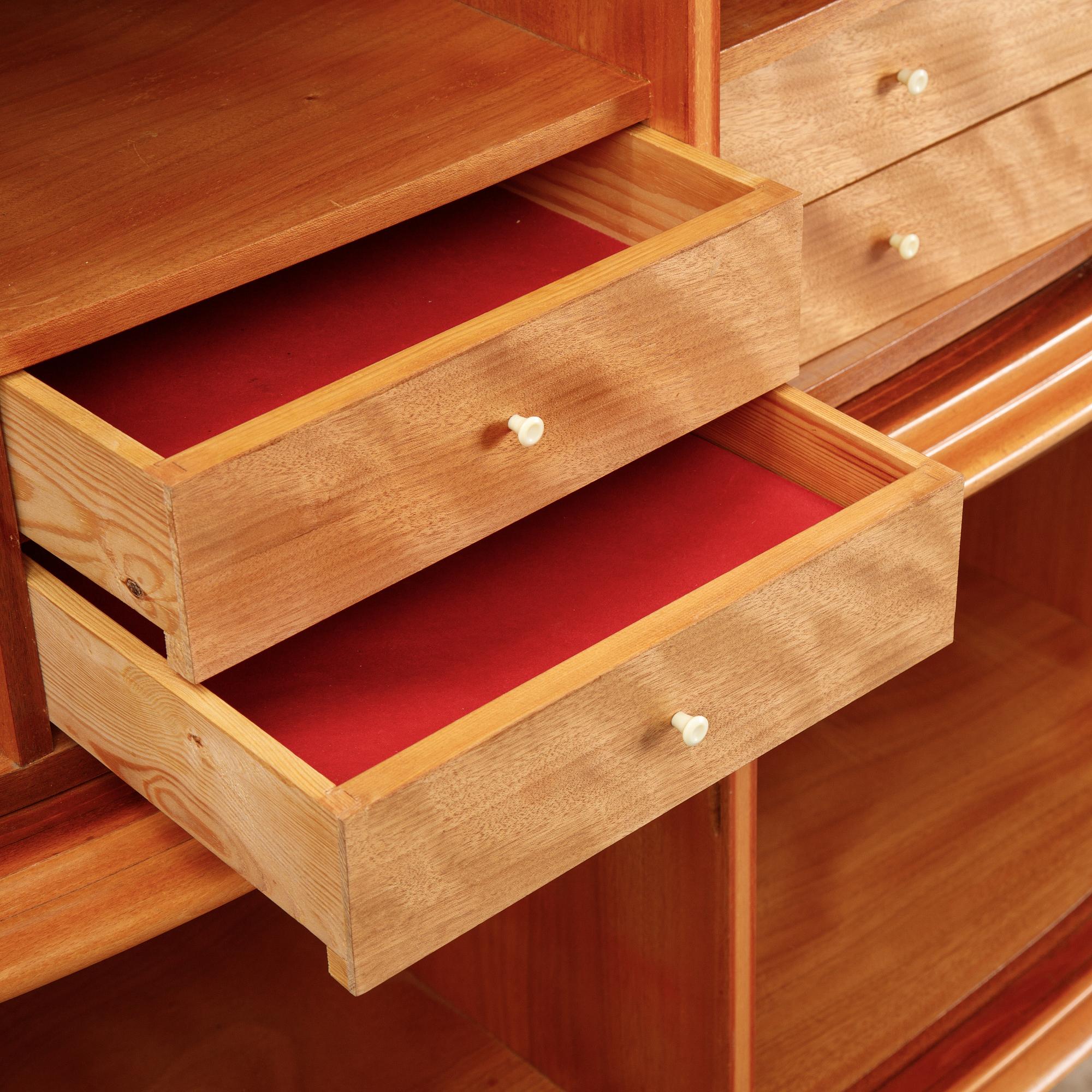 A mahogany veneered cabinet, mid 20th Century.