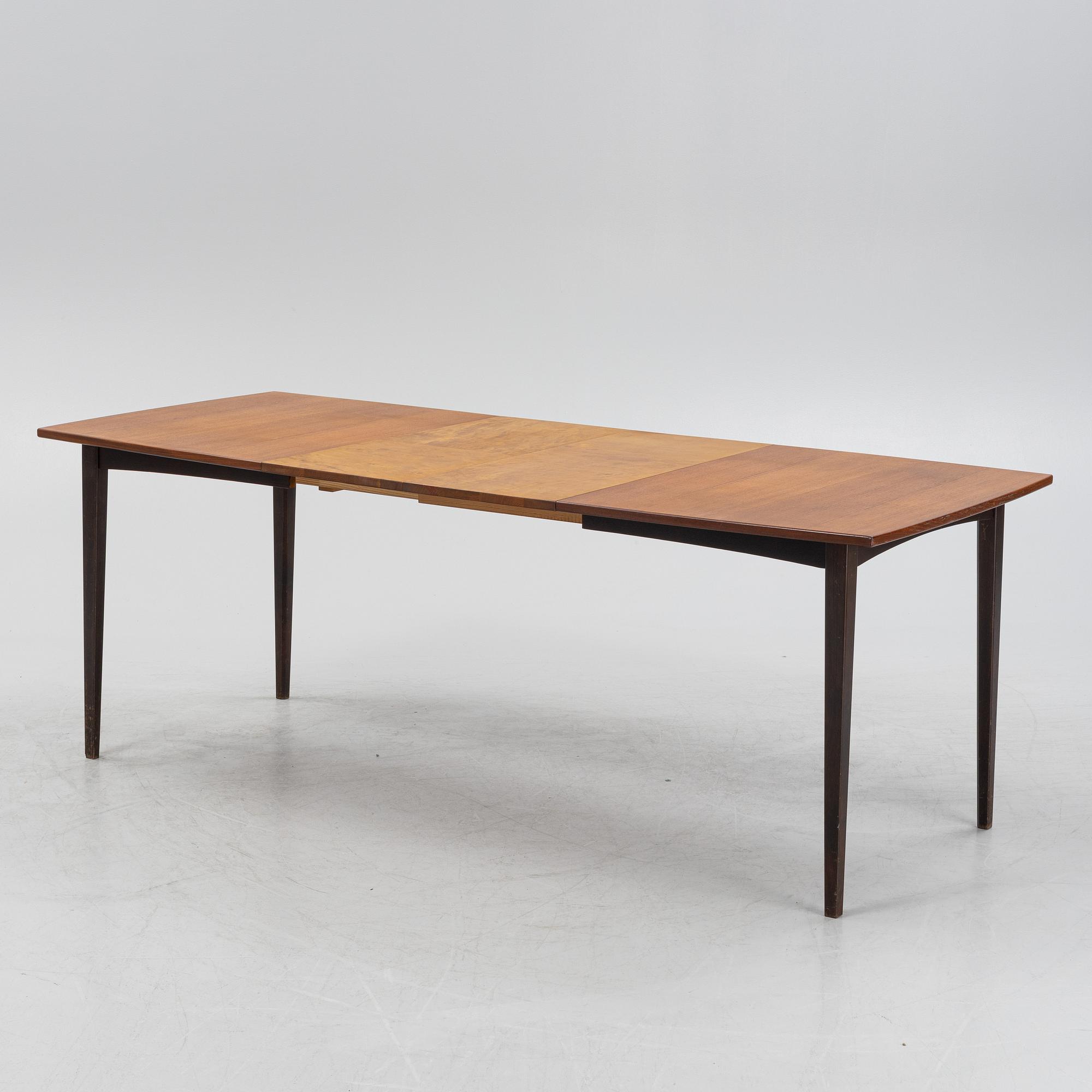 A teak dining table, mid 20th Century.