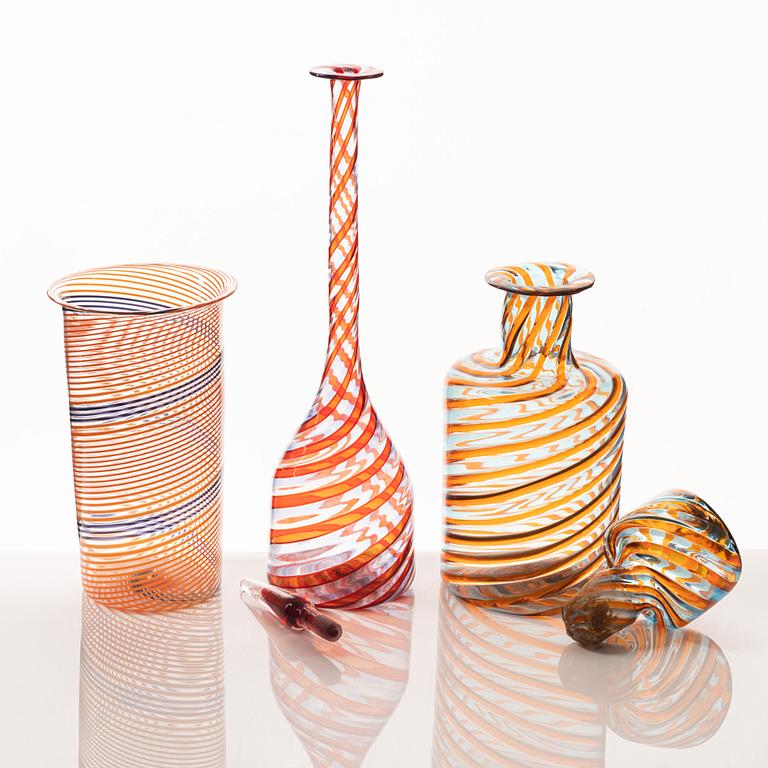 A glass vase and two glass bottles, presumably Murano, Italy.