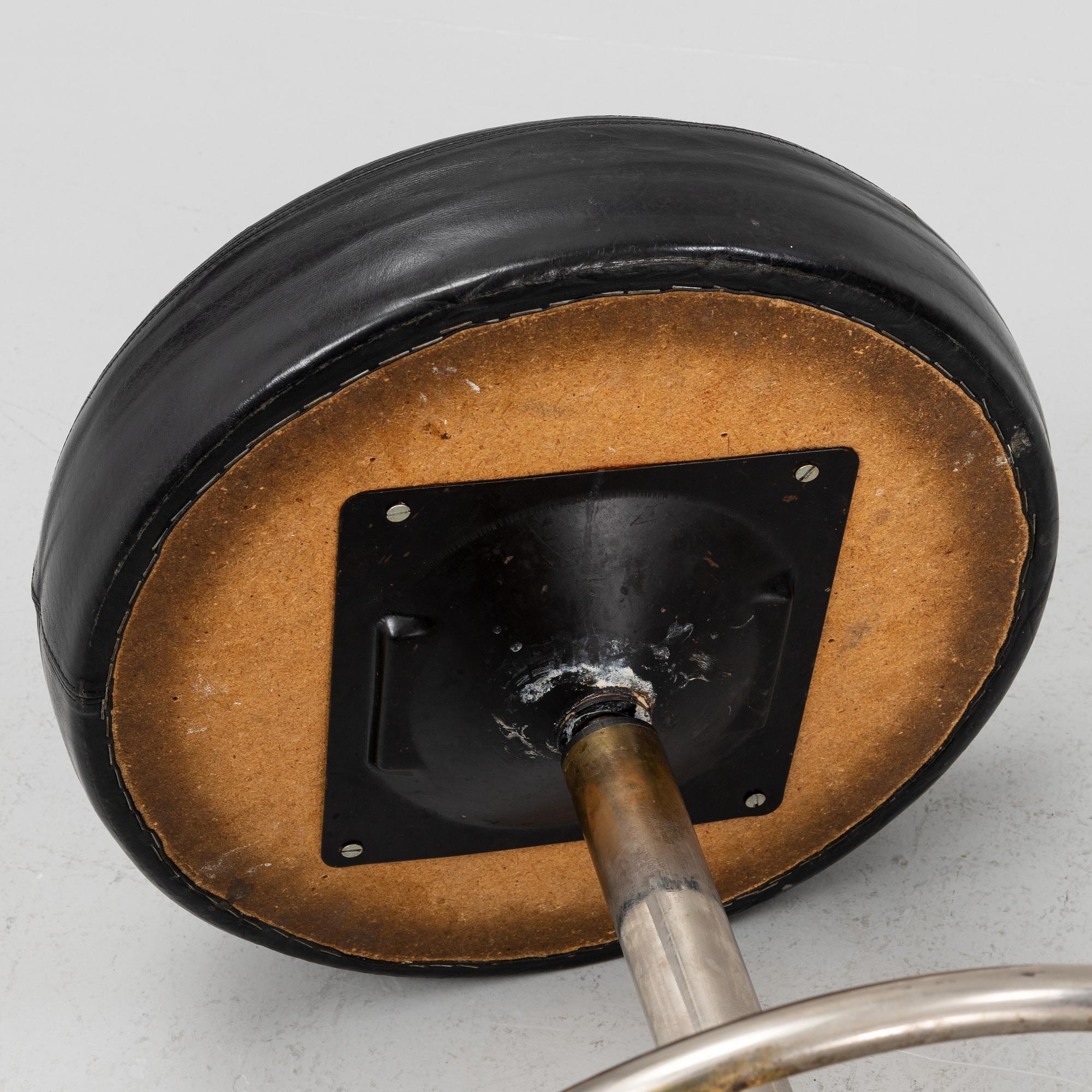 A set of three bar stools from Johansson Design, Sweden, late 20th century.