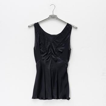 Prada, a set of a black silk top and skirt, size 42.