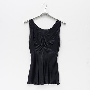 Prada, a set of a black silk top and skirt, size 42.