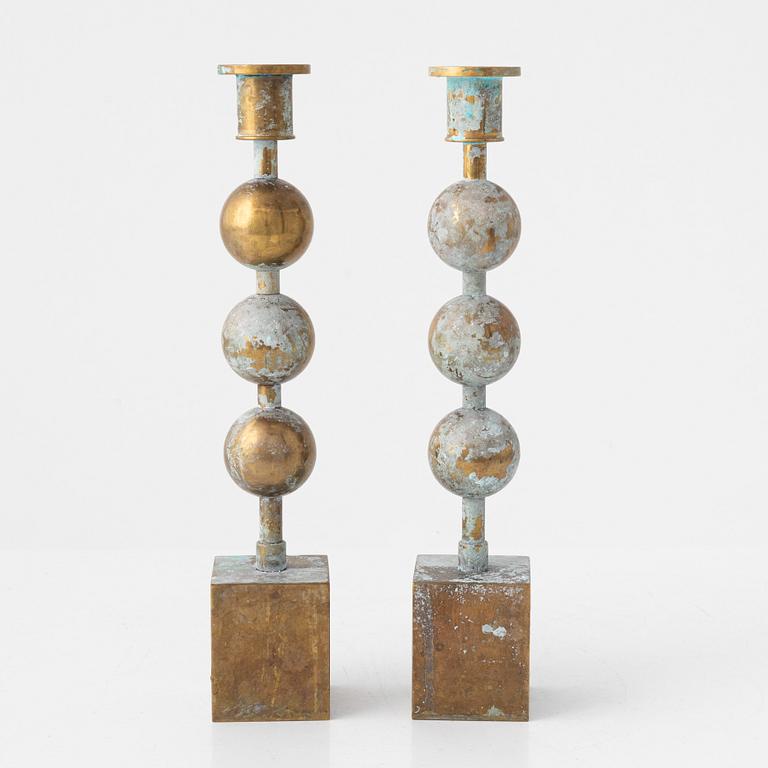 Sigurd Persson, a pair of 'Tre kulor' candlesticks, Firma Svenskt Tenn.