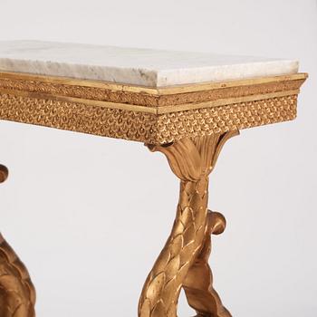 A matched pair of Swedish Empire console tables, first half of the 19th century.